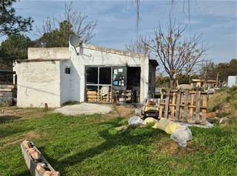 EN VENTA LOTE DE 213 M2 CON CASA, EN BRITOPOLIS.