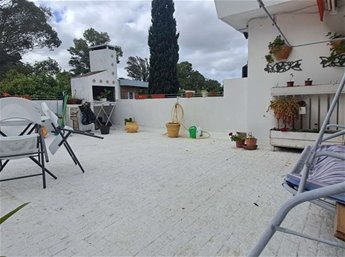 Carrasco Alquiler Apartamento Equipado 1 dormitorio Living comedor con hogar Estar Gran Terraza con parrillero