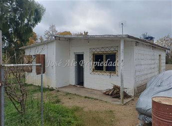 EN VENTA CASA DE 2 DORMITORIOS UBICADA A 450M DE LOS ACCESOS DE LA CIUDAD DE ROSARIO, COLONIA.