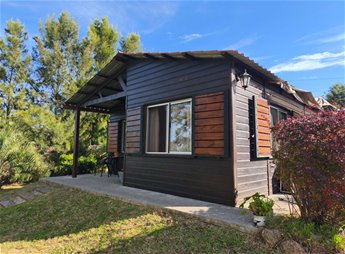 Cabaña de dos dormitorios y buen terreno en Bello Horizonte Divina!