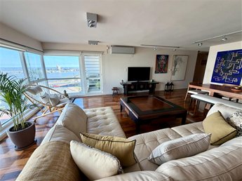 Venta apartamento 4 dormitorios, estar, terraza con parrillero, 2 garajes, vista Puerto del Buceo