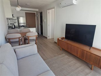 Venta apartamento amueblado con cochera en Tres Cruces
