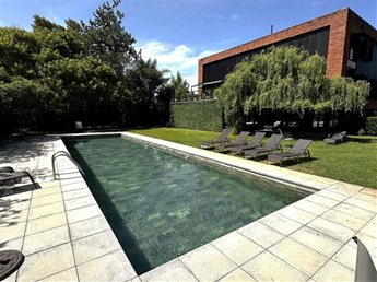 Venta apartamento con renta Carrasco 2 dorm, 2 baños, garage