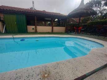 Venta de casa de 4 dormitorios con apartamento independiente, piscina y barbacoa – Lomas de Solymar Sur - foto 6