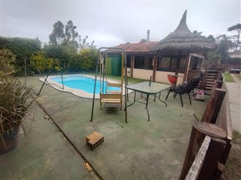 Venta de casa de 4 dormitorios con apartamento independiente, piscina y barbacoa – Lomas de Solymar Sur - foto 5